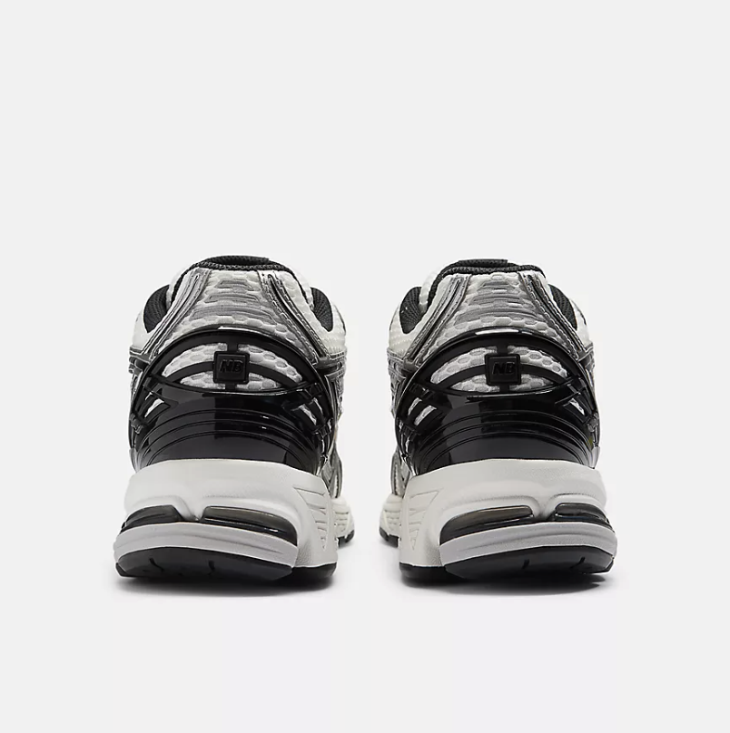 Zapatillas New Balance 1906RER - Metallic Silver con White y Sea Salt